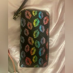 Real Leather, clutch wallet with large capacity. used maybe 1 or twice